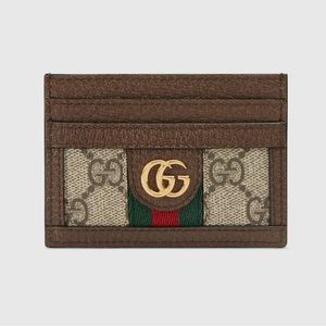 New cardholder. Authentic with receipt, gift bag/box. Received as gift